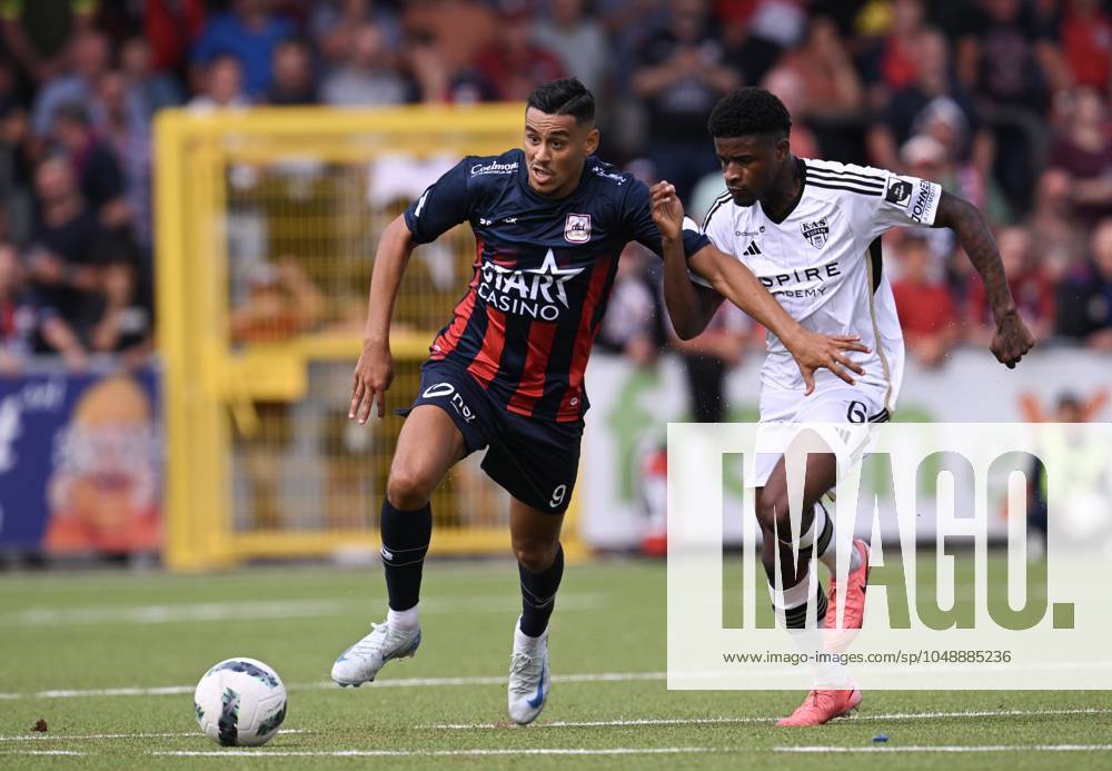 Eupen s Brandon Baiye and Liege s Zakaria Atteri fight for the ball ...