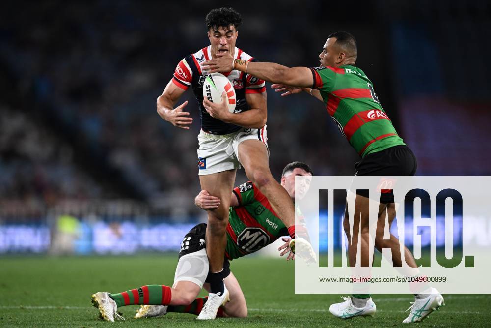 Peter Reed Rabbitohs NRL RABBITOHS ROOSTERS, Joseph Suaalii of the Roosters is tackled by ...