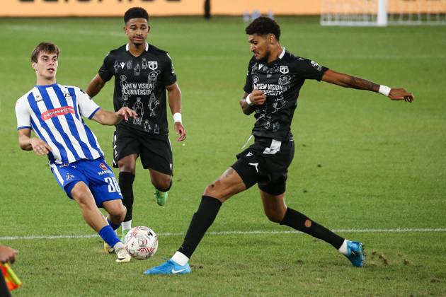 Bjorn Johnsen of Torpedo Kutaisi against Aleksandre Kalandadze of Dinamo Tbilisi during the