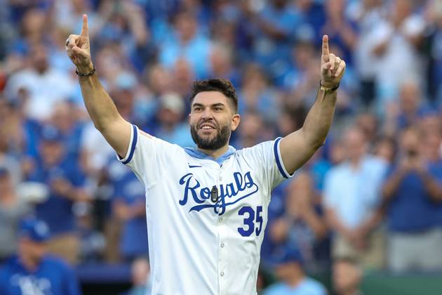 : Former Kansas City Royals player Eric Hosmer reacts to the crowd