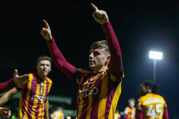 Bobby Pointon of Bradford City celebrates scoring to make it 3-1 during ...