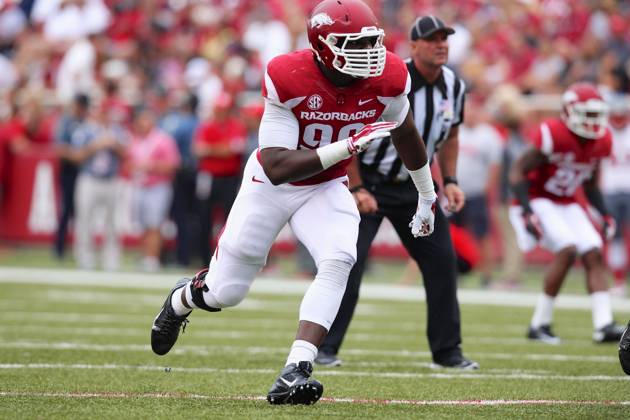 Sep 6, 2013: Razorback defensive end Brandon Lewis 99 comes around the ...