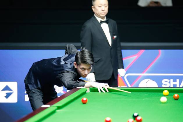 SHANGHAI, CHINA - JULY 28: Wang Xinbo of China plays a shot in the ...