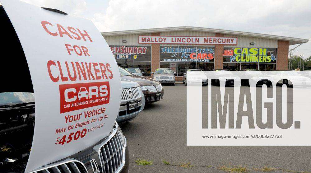 A Sign At Malloy Lincoln Mercury Advertises The Cars Allowance Rebate 