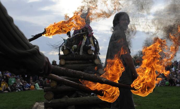 People in Prague burn rag and straw witches on April 30. People around ...