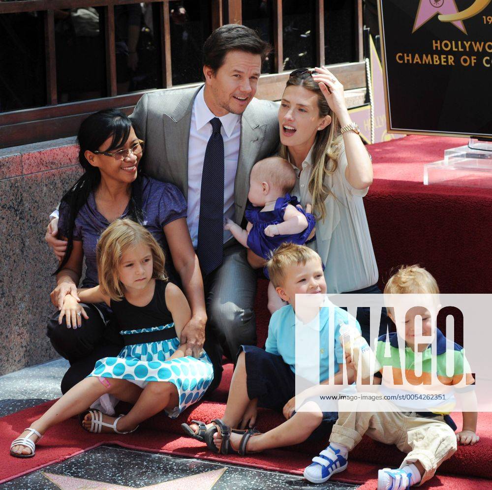 Mark Wahlberg and his wife Rhea Durham take their daughter Grace