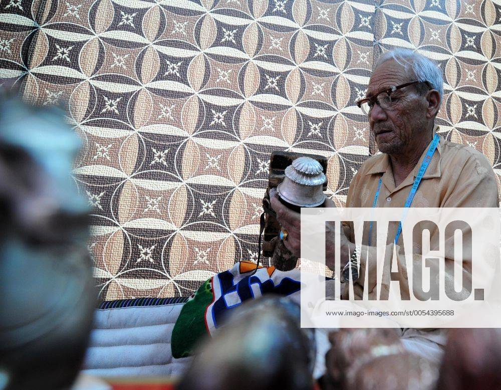 William Rigzin SHANGHAI, Sept. 2, 2010 Rigzin, a handicraftsman, polishes silverware ...