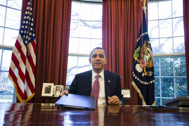 U.S. President Barack Obama Signs The Stopgap Funding Bill Passed By ...