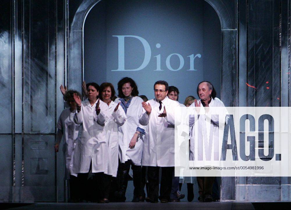 employees-of-the-christian-dior-fashion-house-salute-the-audience-at