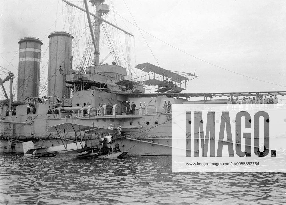 HMS Hibernia of the Royal Navy . Hoisting a Hydroplane on board . 1914 ...