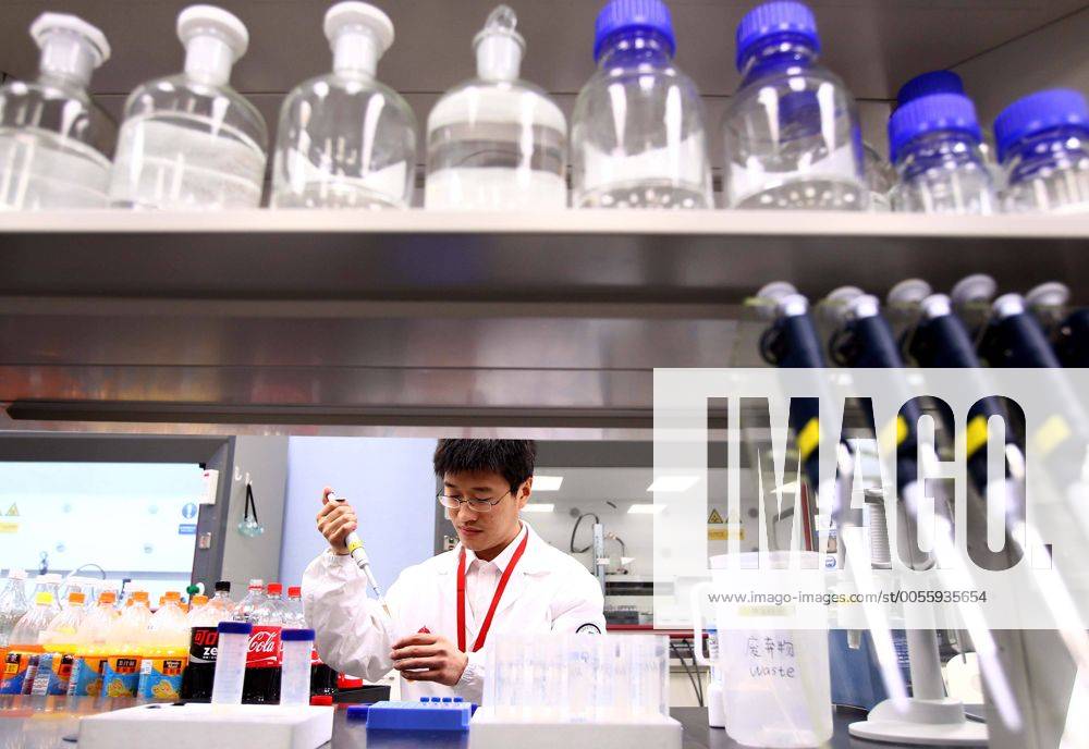 BEIJING, Sept.11, 2011 An employee works at the lab inside a complex ...
