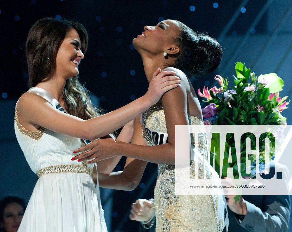 Miss Angola Leila Lopes (R) and Miss Ukraine Olesia Stefanko react after  Lopes was named Miss