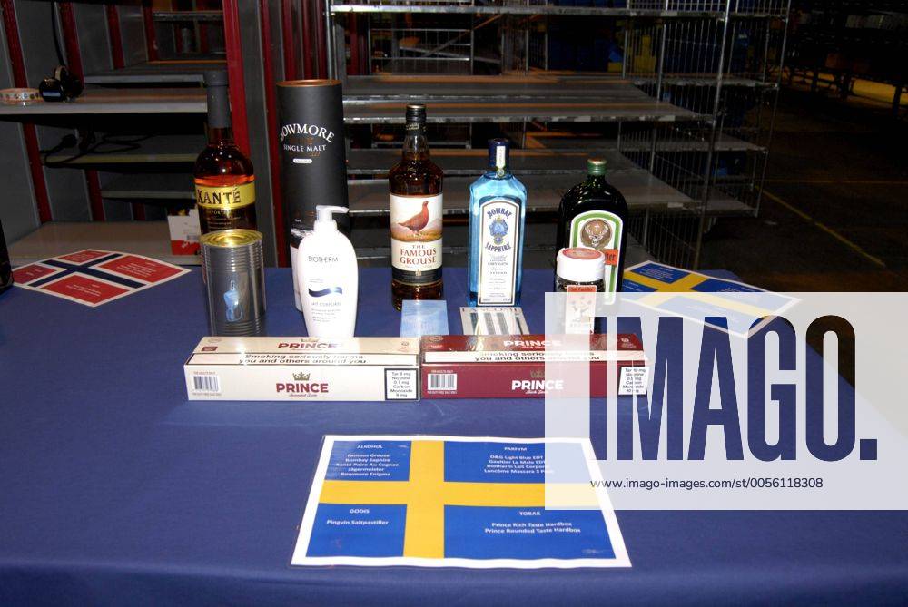 SWEDEN LUND Thomas Cook worker packing tax free or duty free goods in