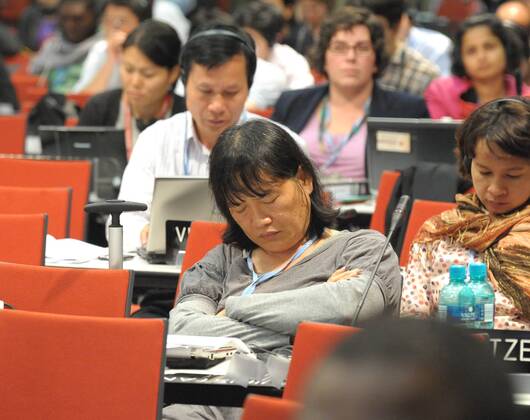durban-dec-11-2011-a-delegate-sleeps-on-a-corridor-sofa-as-the