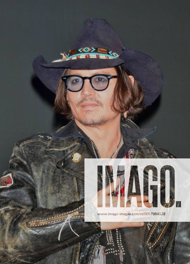 May 13, 2012, Tokyo, Japan - Johnny Depp, sporting a leather jacket and ...