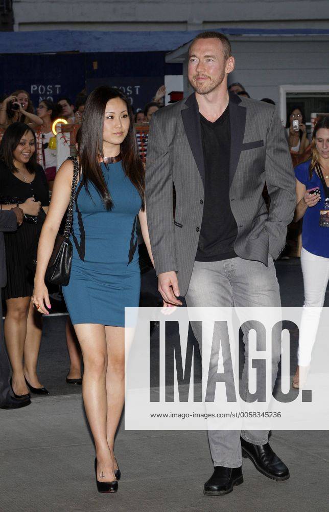 Kevin Durand and Sandra Cho arrive at the NY premiere of Entertainment ...