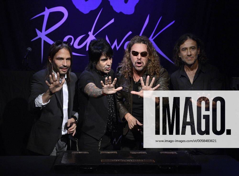 Aug 21, 2006; Beverly Hills, CA, USA; The Mexican rock band 'Mana', from  left, JUAN DIEGO CALLEROS, ALEX GONZALEZ, FHER and SERGIO VALLIN, during a  press event for the release of their