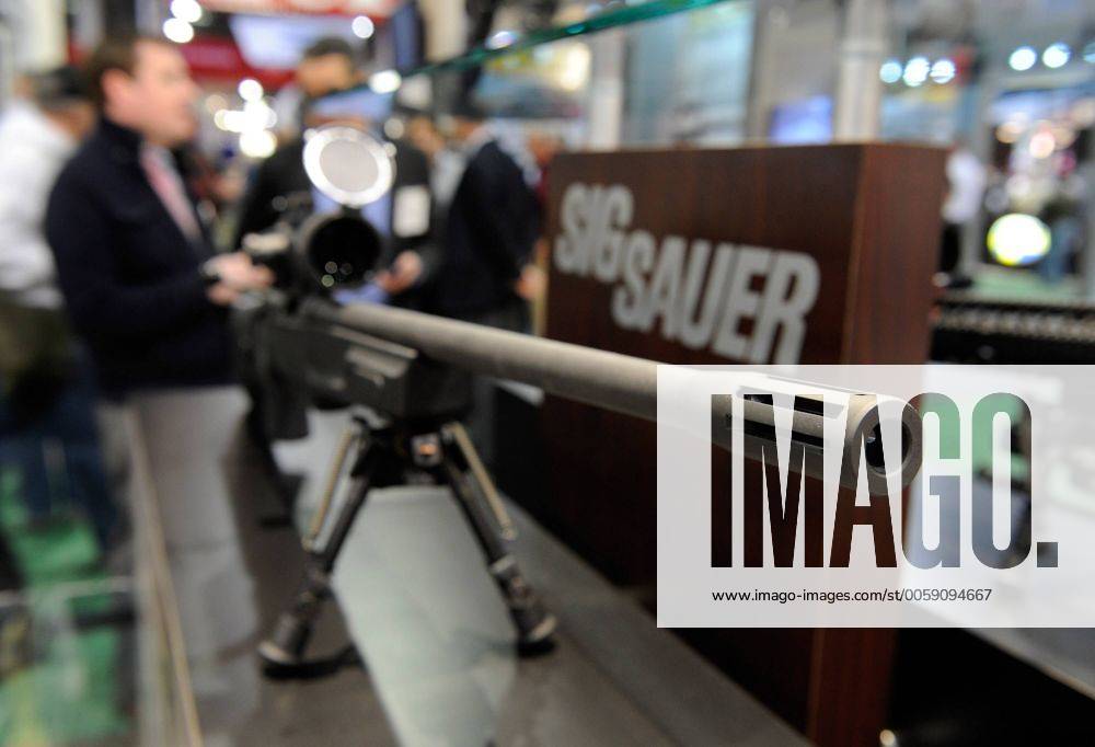 A SSG 3000 high-powered rifle is on display at the Sig Sauer booth at ...