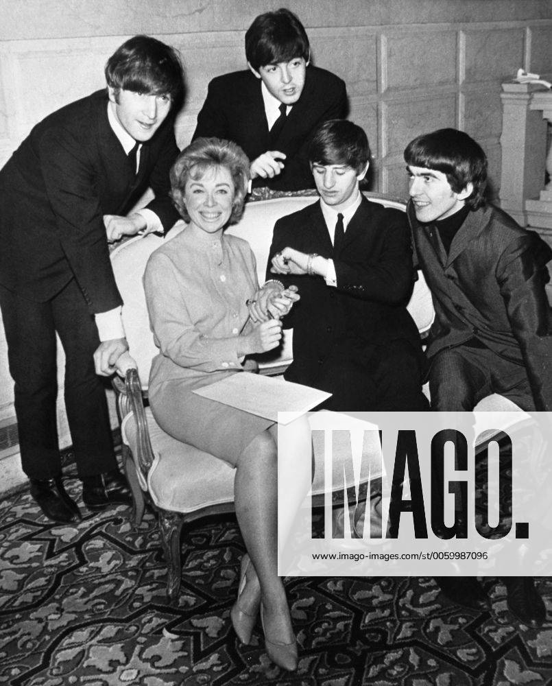 The Beatles with psychologist , Dr Joyce Brothers , who has her pulse ...