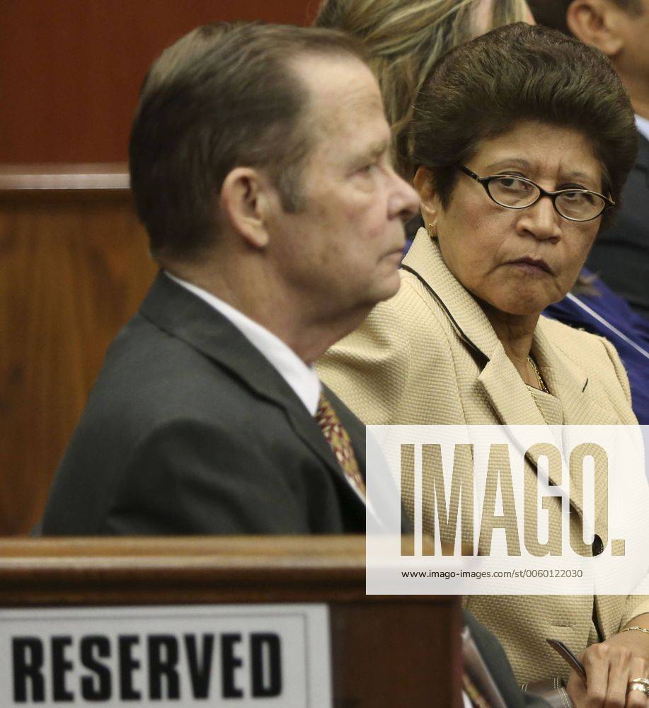 Gladys Zimmerman looks at Robert Zimmerman Sr., Zimmerman s