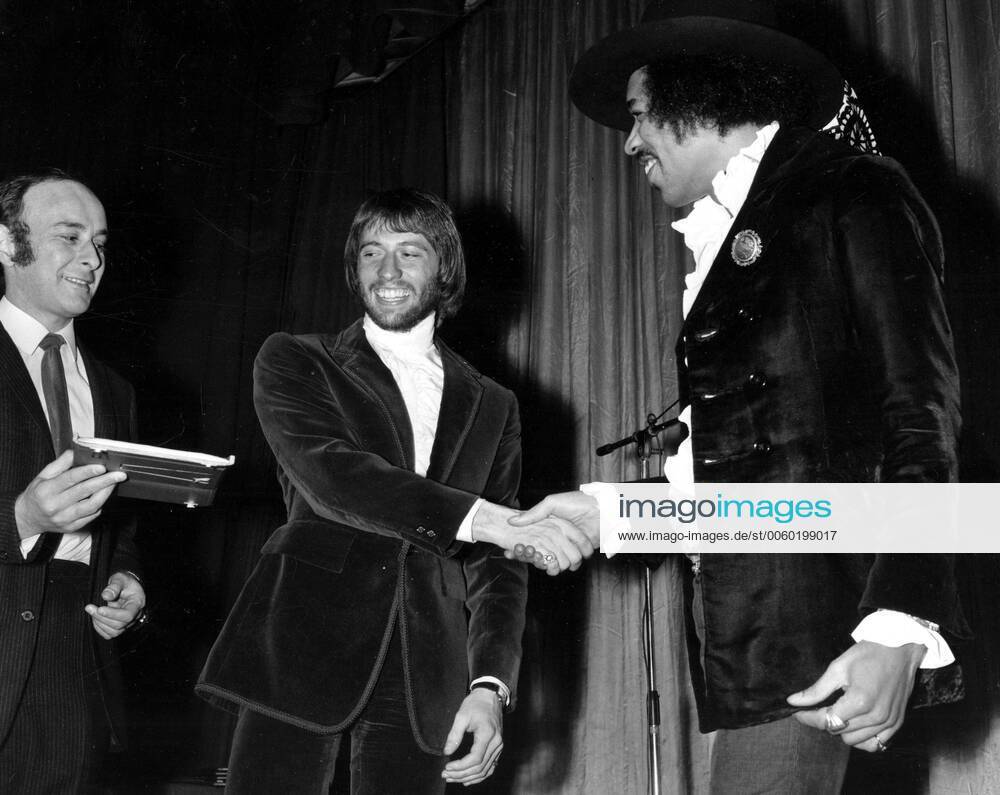 15th February 1969: The Bee Gees Maurice Gibb, Congratulates Jimi 