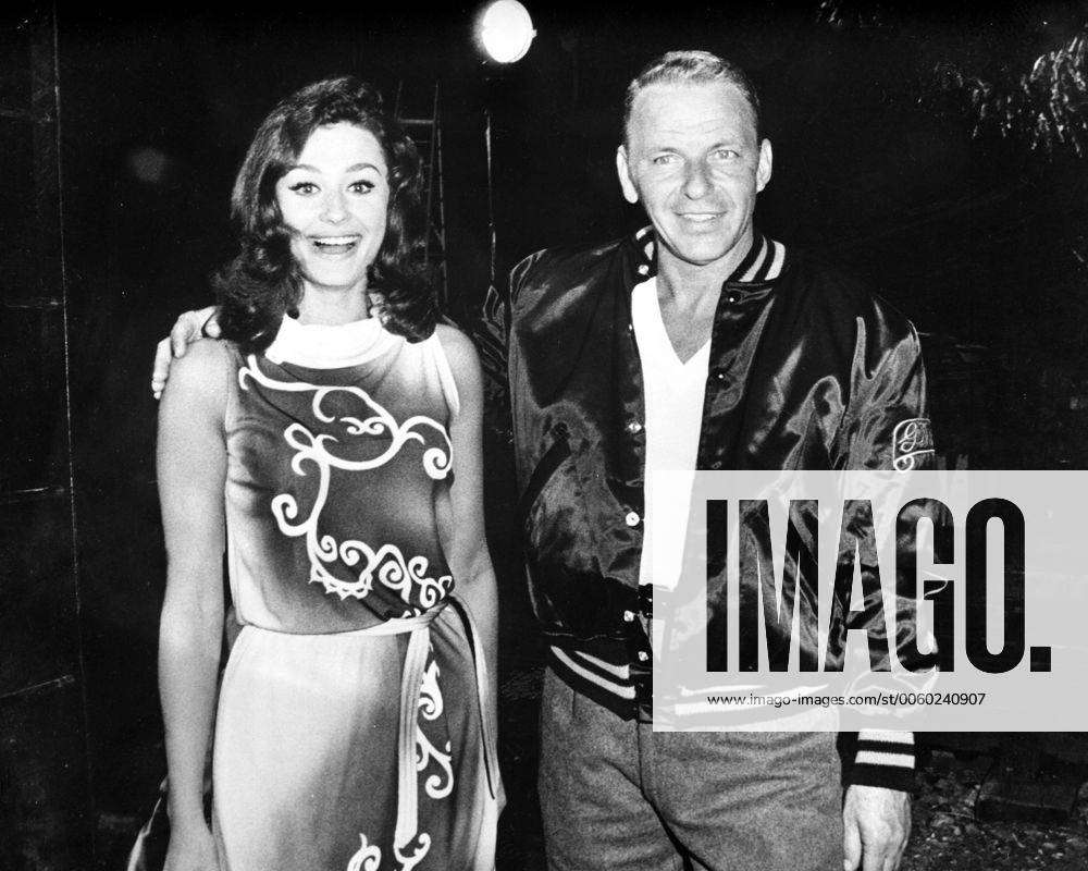 Frank Sinatra with 21-year-old pretty actress Raffaella Carra shortly after  it was announced that
