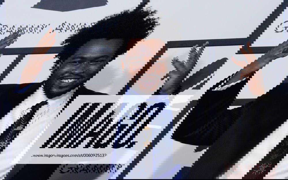 Recording artist James Fauntleroy arrives for the 56th annual Grammy