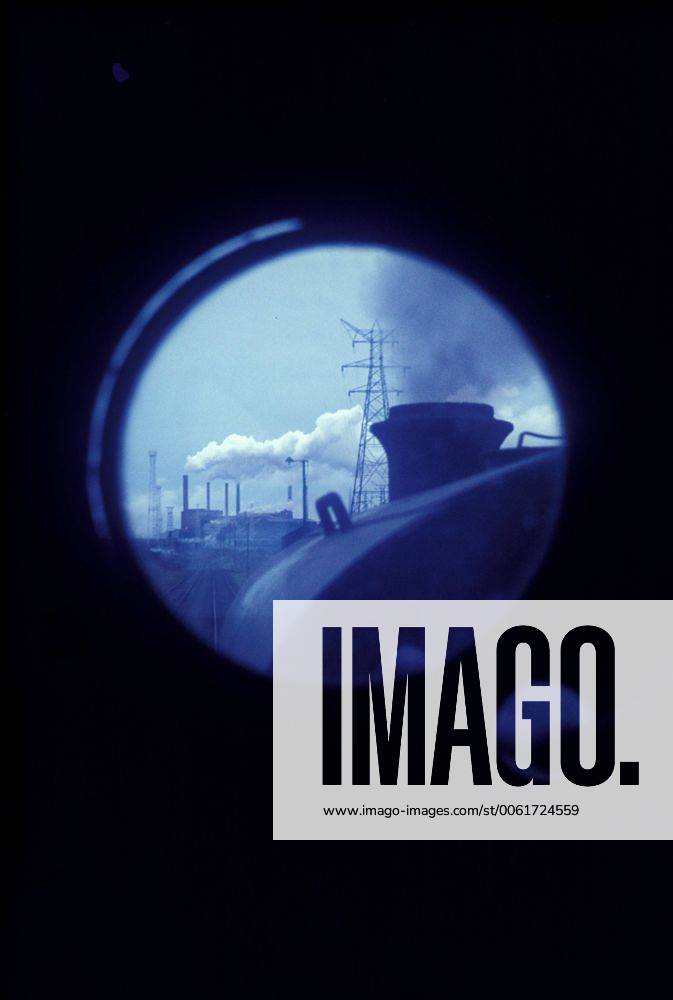 View from the footplate. A loaded ironstone train approaches Corby Iron