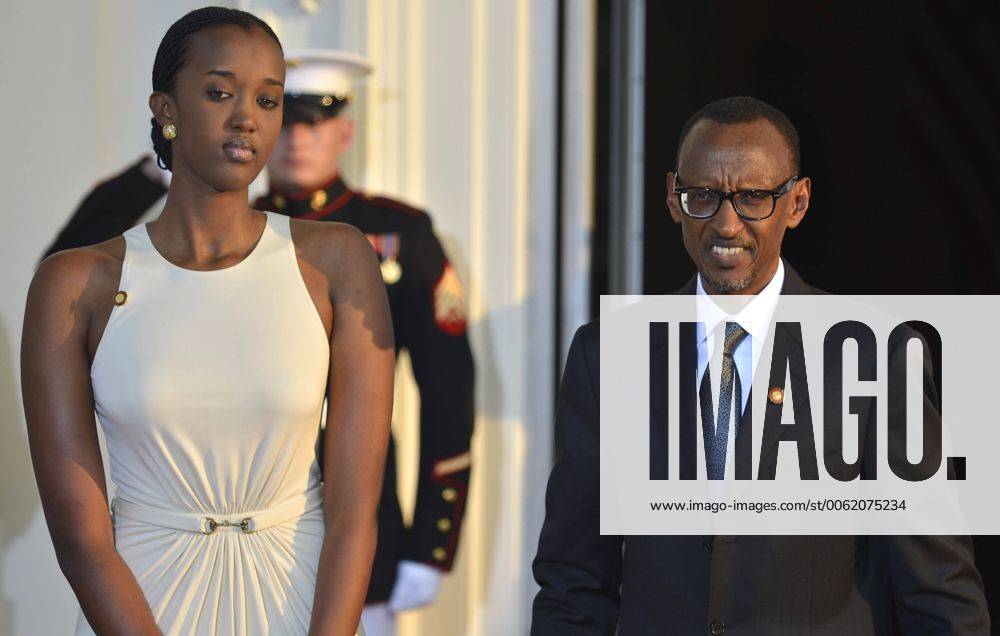 Rwanda s President Paul Kagame and daughter Ange greet the press as