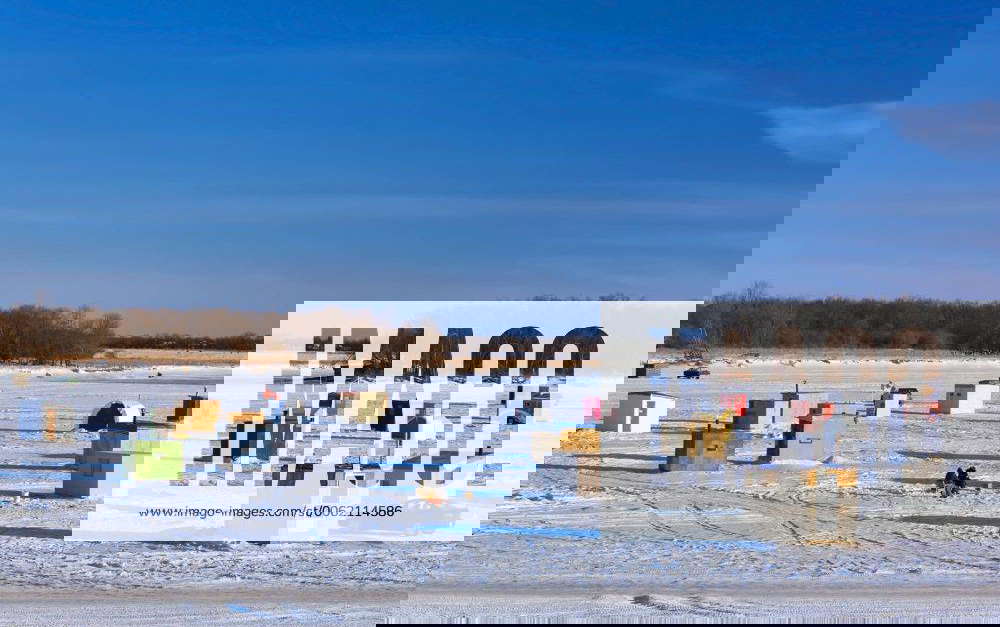 Ice fishing shacks on the Red River, just north of Winnipeg, near the