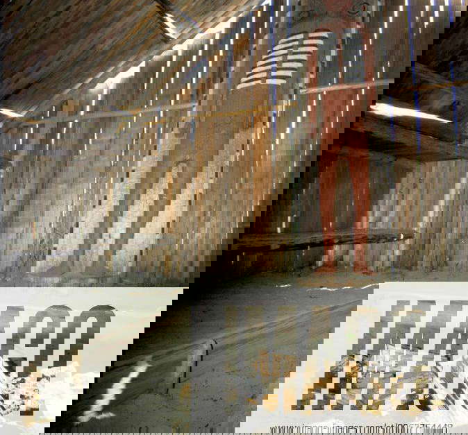 Inside a Chinook dwelling called a Longhouse made from cedar planks