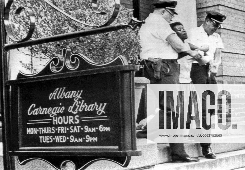 Albany, Georgia: July 7, 1962 Police officers carry away a teenage ...