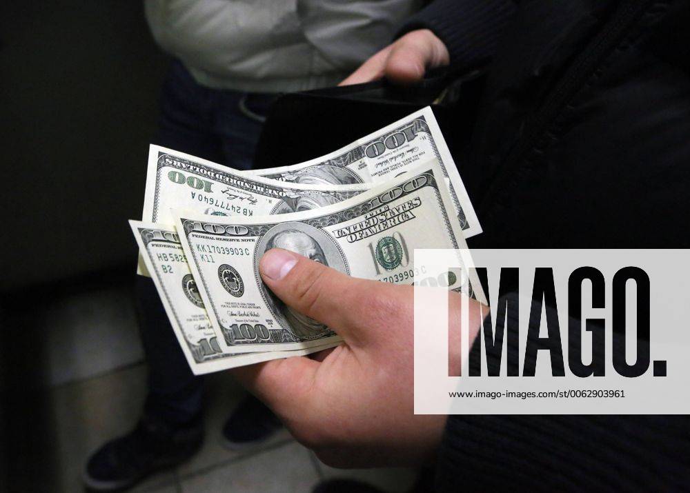 MOSCOW, RUSSIA. NOVEMBER 6, 2014. A customer of a currency exchange