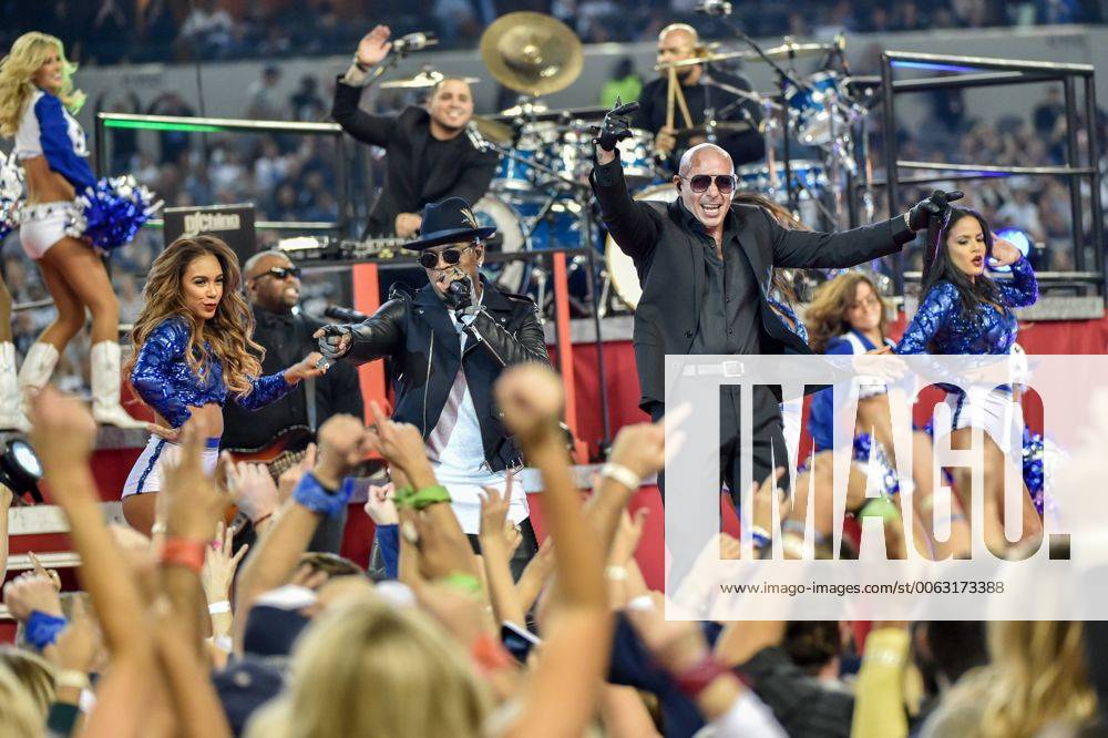 Rapper Pittbull performs during halftime of the Dallas Cowboys and