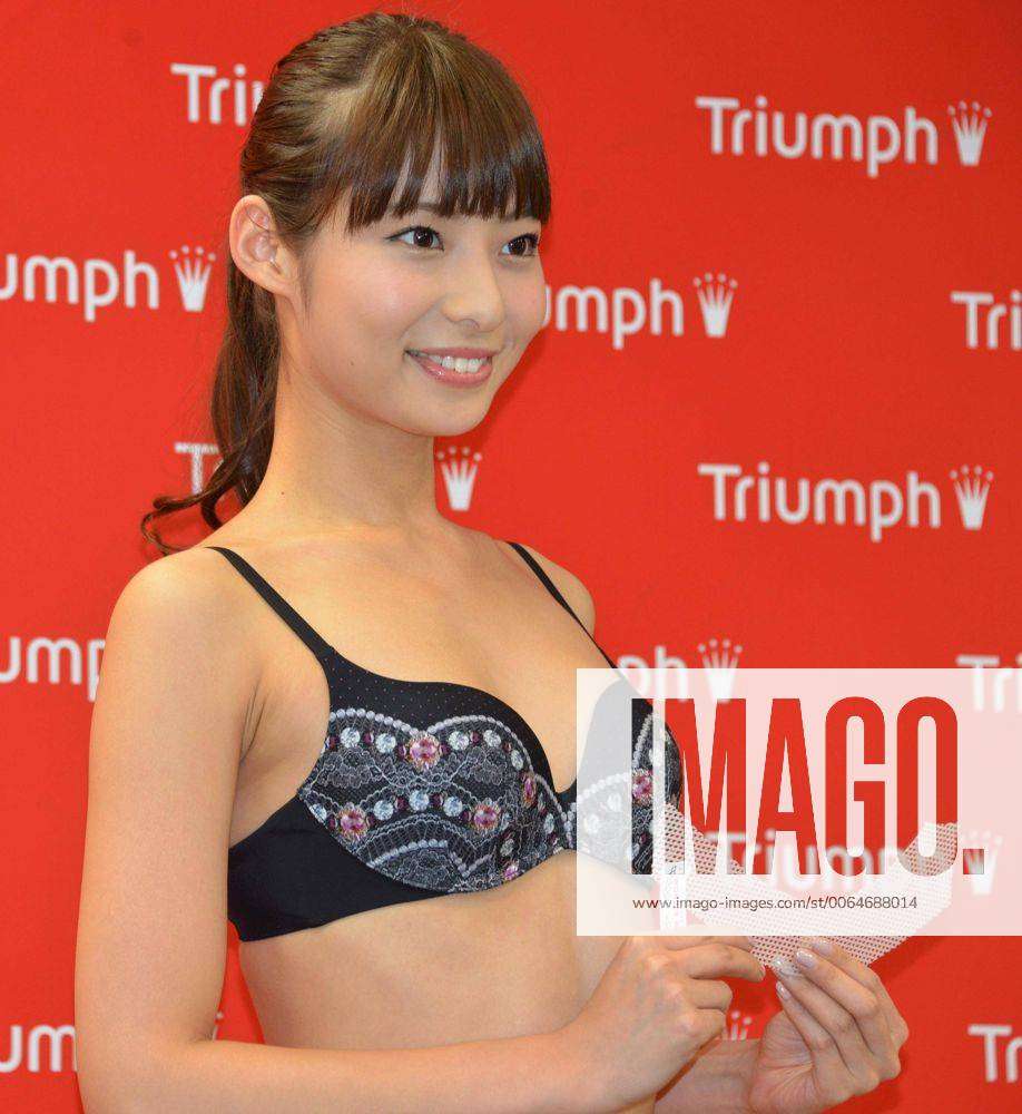 Triumph International (Japan) develops new line of lingerie A model holds a  mesh sheet which will