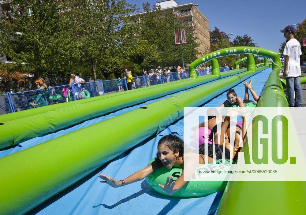 participants-slide-down-the-330-metres-long-slide-during-the-slide-the