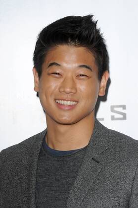 Korean-American actor Ki Hong Lee attending the Maze Runner: The Scorch ...