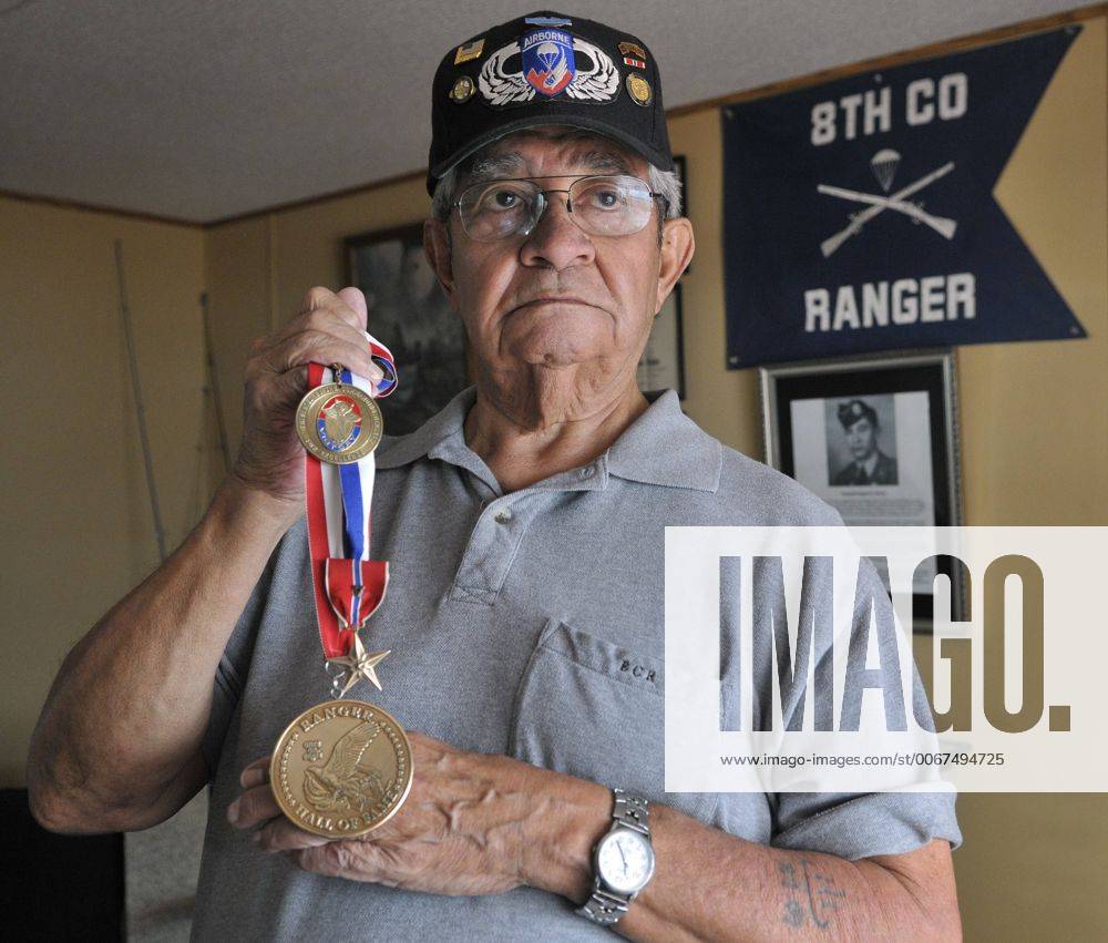 Jan. 9, 2014 U.S. E.C. Rivera holds three medals, including a