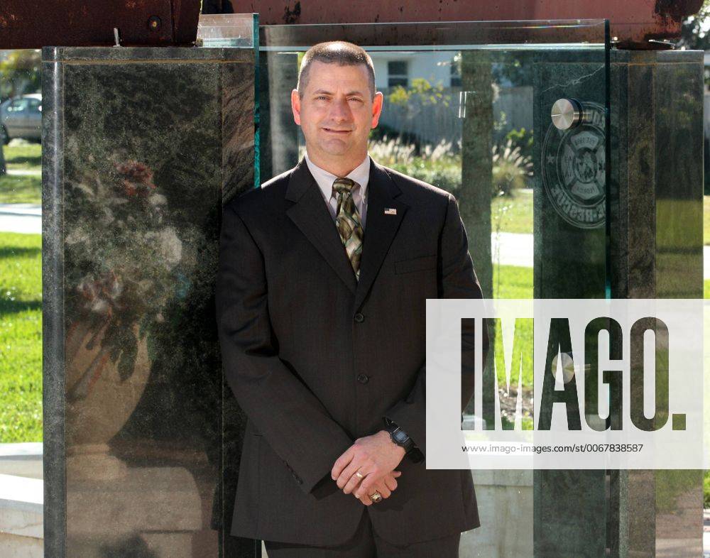 Portrait of new Tequesta police chief Christopher Elg in front of the ...