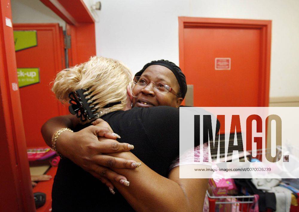 Dec. 20, 2011 Florida, U.S. LANTANA Cheryl Smith of Lantana hugs Lantana Kmart store