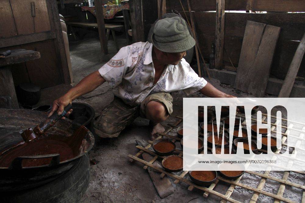 Indonesia Palm sugar farmers in Tomohon Joseph Sem Wungow (64) is