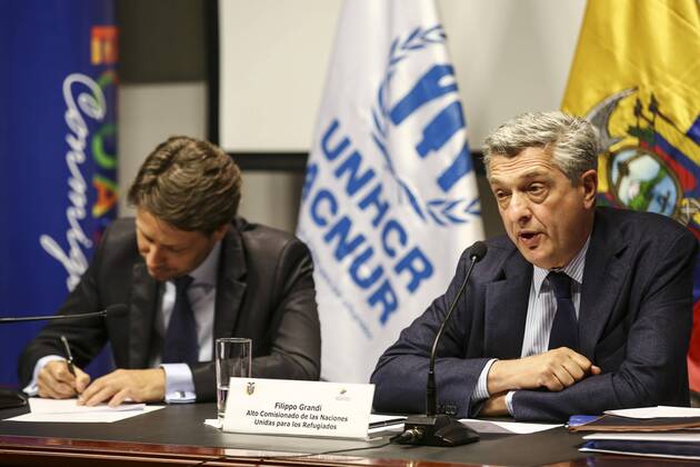 United Nations High Commissioner for Refugees Filippo Grandi exchanges ...