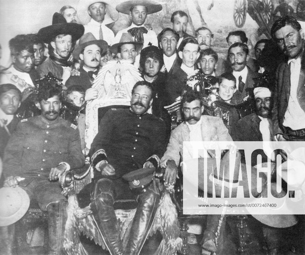 Rodolfo Fierro (far right), stands by as Pancho Villa (in the ...