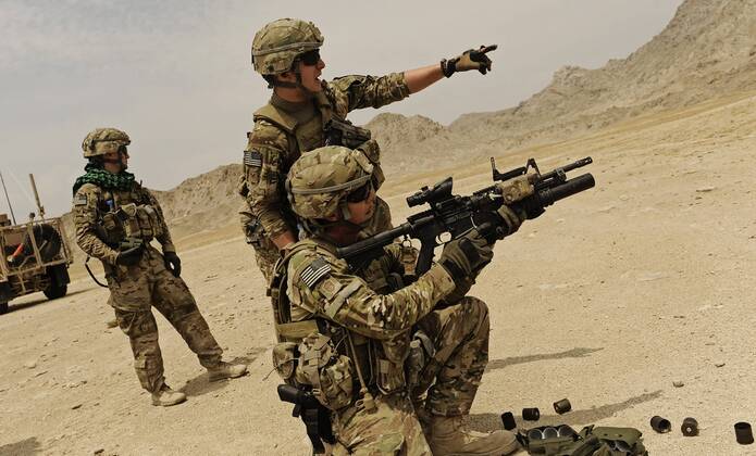 Soldier attached to Laghman Provincial Reconstruction Team, clears the ...