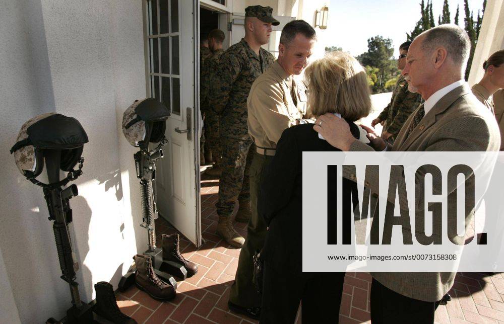 CAMP PENDLETON, CA - Connie and Steve Mitchell pause outside the chapel ...