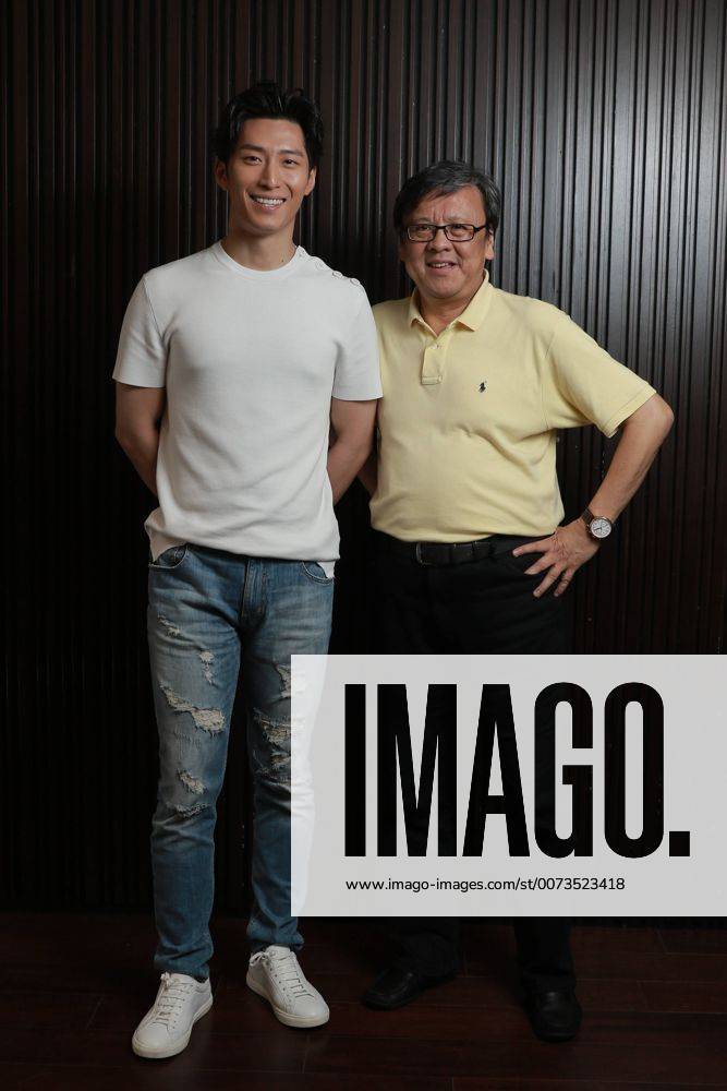 HONG KONG, CHINA SEPTEMBER 19 Actor Shawn Dou (L) poses as he