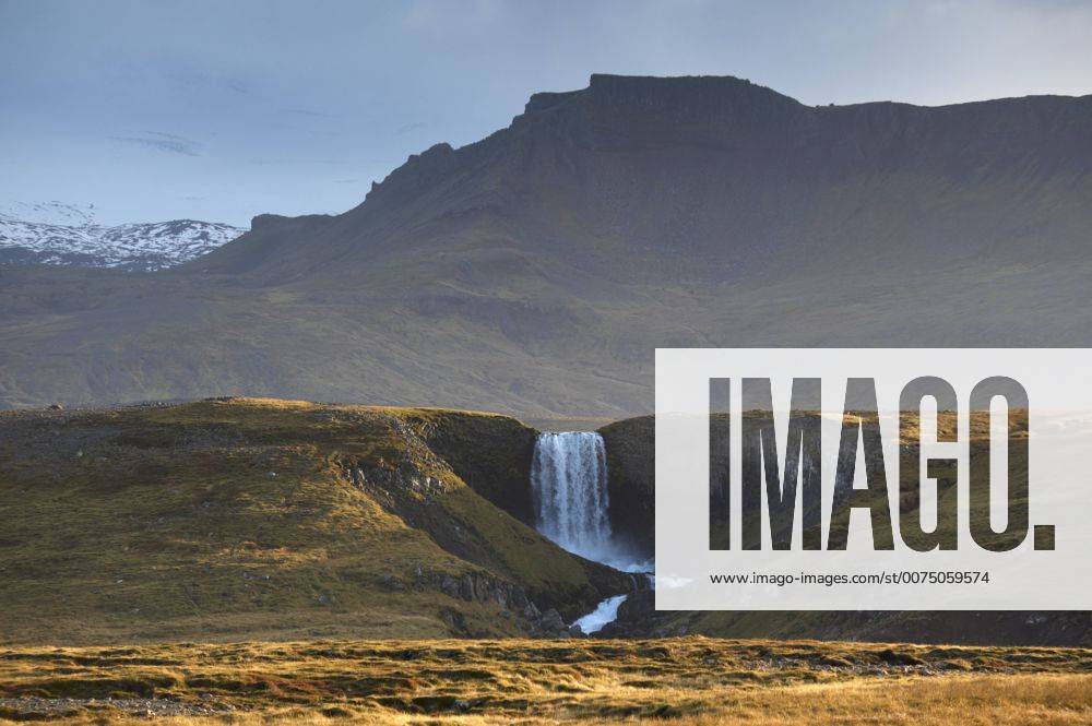 Waterfall in Snaefellsjokull National Park, Snaefellsjokull behind ...