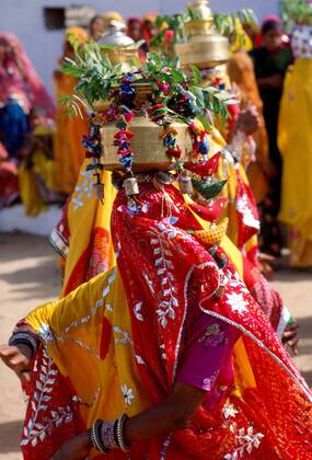 Veiled dancer at a festival in Nalu Village, Rajasthan, India