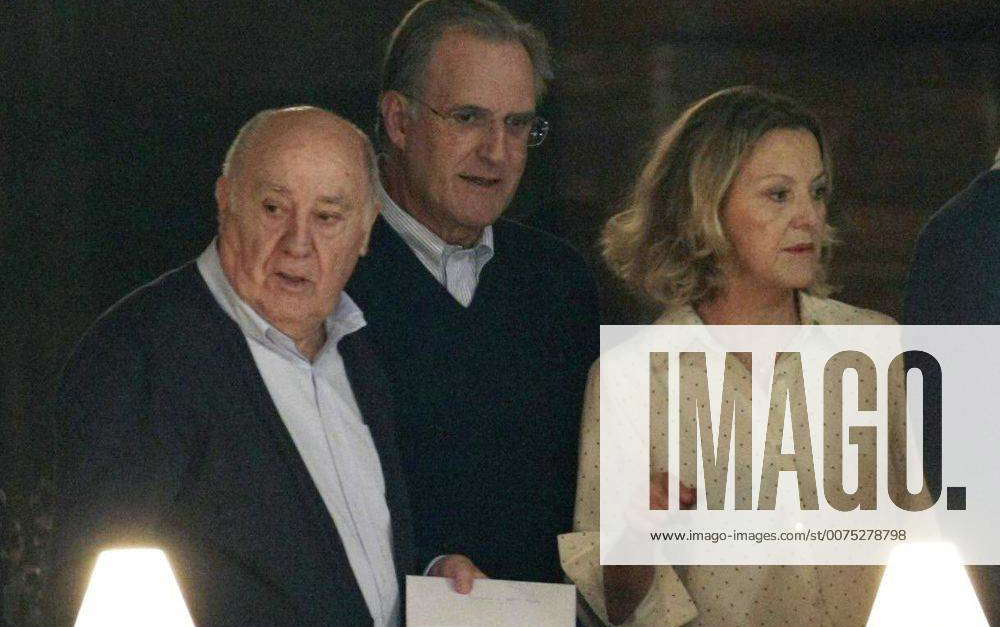 Chairman of Inditex group, Amancio Ortega (L), his wife Flora Perez ...