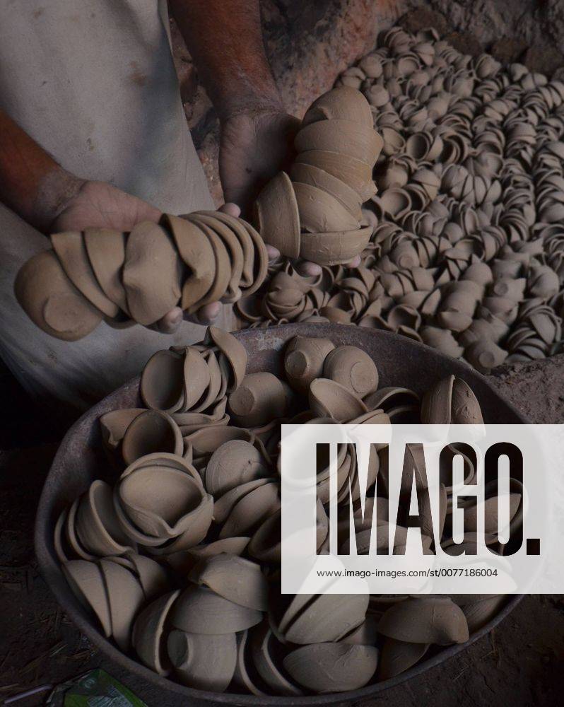 Lahore Pakistani Artisan Preparing Clay Pot An artisan uses a pottery